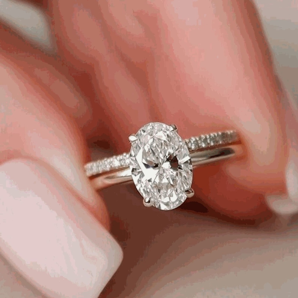 Oval Cut Diamond Hidden Halo Bridal Ring Set For Women