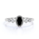  Oval And Round Shaped 5 Stone Prong Set Black And White Diamond Ring For Women